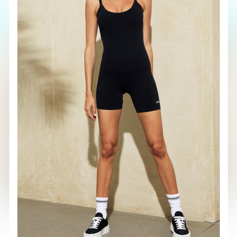 ALO seamless ribbed mellow onesie in black- size small